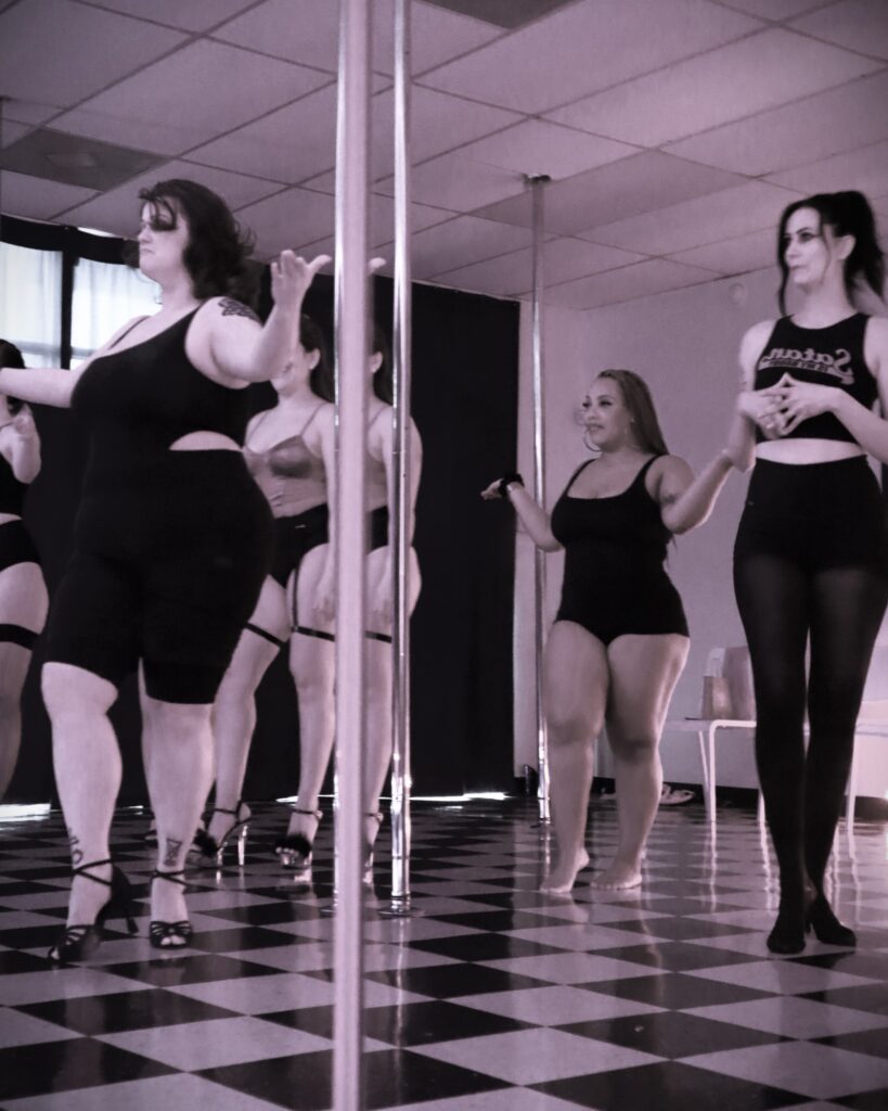 Students in action during a Galentine-themed burlesque class in Houston Texas led by Piper Daily