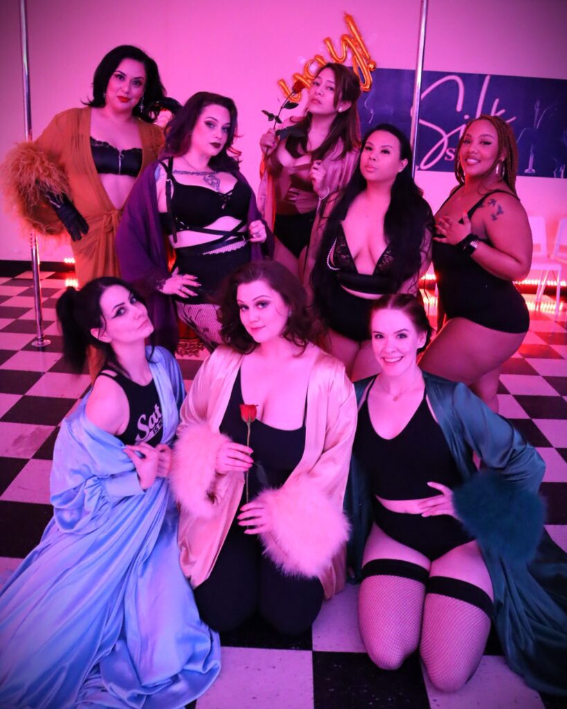 Group of burlesque students posing for the camera after class.